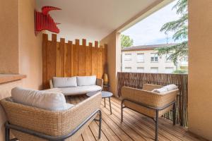 Appartements Le Cocon d-Adamille - Appt avec piscine partagee : photos des chambres