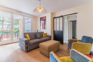 Appartements Le Cocon d-Adamille - Appt avec piscine partagee : photos des chambres