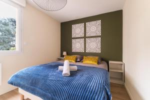 Appartements Le Cocon d-Adamille - Appt avec piscine partagee : photos des chambres