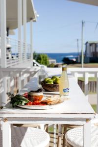 Dreamy coastal escape steps from the sea