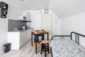 Appartements Confortable studio tout confort : photos des chambres