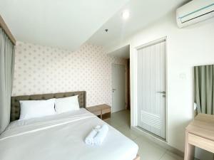 Fancy and Nice 3BR at Grand Kamala Lagoon Apartment By Travelio