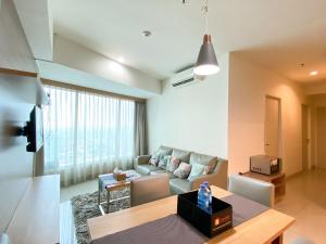 Fancy and Nice 3BR at Grand Kamala Lagoon Apartment By Travelio