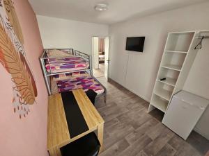 Sejours chez l'habitant Appartement GGCH 4 chambres : photos des chambres