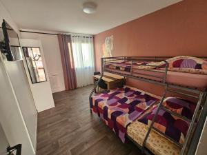 Sejours chez l'habitant Appartement GGCH 4 chambres : photos des chambres