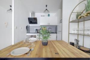 Appartements OIQIA • Sahel : photos des chambres
