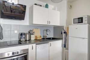 Appartements OIQIA • Sahel : photos des chambres