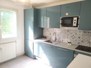Sejours chez l'habitant Family-friendly First-class Appartment : photos des chambres