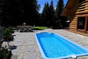 Polana Słowikowa 5 star- domek w górach z jacuzzi, sauna,basen,ogród z lasem, kominek i narty