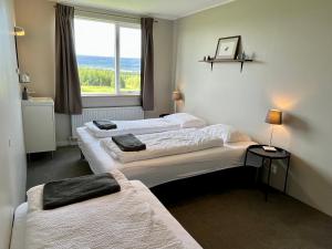 Triple Room with Shared Bathroom room in Eyjólfsstadir Guesthouse