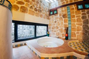 La casa de piedra y colores en Chichén Itzá