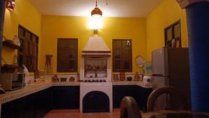 La casa de piedra y colores en Chichén Itzá