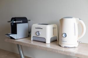 Appartements T2 lumineux, a 10 min de Disney, au pied de la gare avec parking prive : photos des chambres