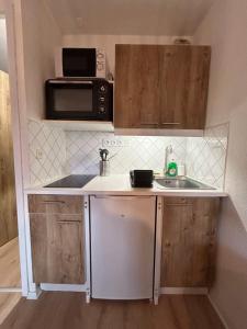 Appartements Chalets du Village - Tily Home - Studio centre village : photos des chambres