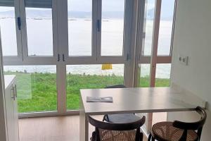 Apartamento playa Banda do Río