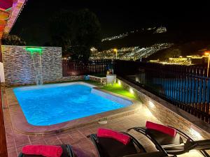 Villa Puerto Rico in front of the shopping center with private heated saltwater pool with jacuzzi & t able fút boll & arcade games OR St andard Villa Puerto Rico in front of the shopping center with private heated saltwater big jacuzzi & arcade game