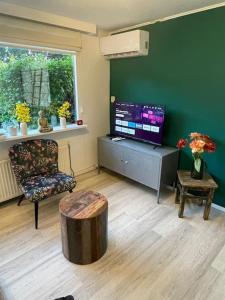 Tiny house met tuin en 2 fietsen in Putten op de Veluwe