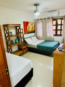 Casa incrível praia dos anjos