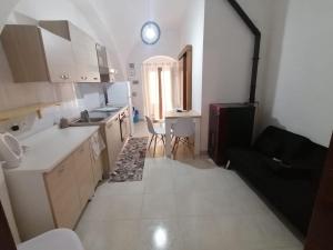 Appartamento 31 posti con cucina e parcheggio privato gratuito