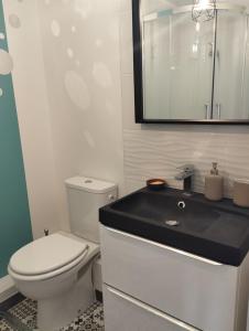 Appartements La Cite du 56 : photos des chambres