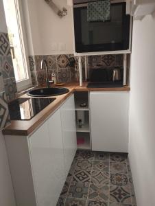 Appartements La Cite du 56 : photos des chambres