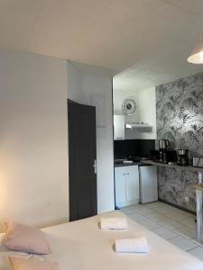 Appartements L-Entre-Temps, Le Lys et L Iris : photos des chambres