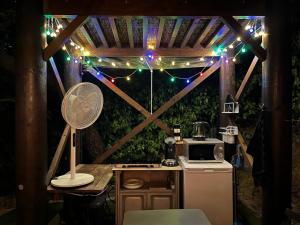 Tentes de luxe Les lucioles cabane chalet avec Jacuzzi privatif : photos des chambres