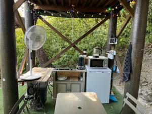 Tentes de luxe Les lucioles cabane chalet avec Jacuzzi privatif : photos des chambres