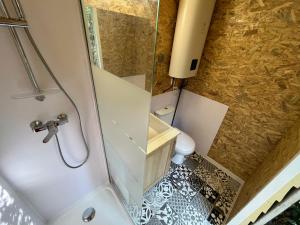 Tentes de luxe Les lucioles cabane chalet avec Jacuzzi privatif : photos des chambres