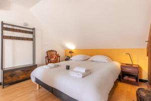 Maisons de vacances L-Ozormo - Climatisee - Maison - Jardin : photos des chambres
