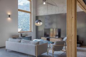 Chalets Chalet mitoyen - Jacuzzi - Cousinade I : photos des chambres