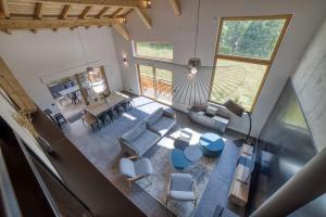 Chalets Chalet mitoyen - Jacuzzi - Cousinade I : photos des chambres