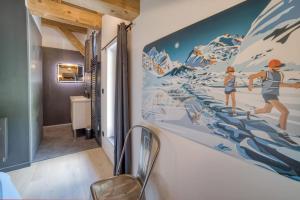 Chalets Chalet mitoyen - Jacuzzi - Cousinade I : photos des chambres