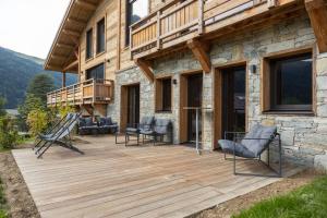 Chalets Chalet mitoyen - Jacuzzi - Cousinade I : photos des chambres