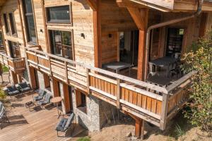 Chalets Chalet mitoyen - Jacuzzi - Cousinade I : photos des chambres