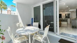 LaPlaya 102E-Tropical garden view near the pool!