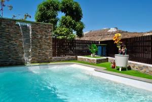 Villa Puerto Rico in front of the shopping center with private heated saltwater pool with jacuzzi & t able fút boll & arcade games OR St andard Villa Puerto Rico in front of the shopping center with private heated saltwater big jacuzzi & arcade game