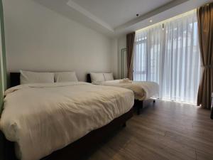 Phòng Tiêu Chuẩn Có 2 Giường Cỡ Queen (Standard Queen Room with Two Queen Beds)