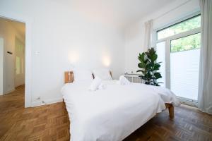 65 SQM Apartment - 2 Schlafzimmer - Balkon - Küche