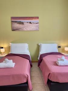 Two-Bedroom Apartment room in Bnbook-TommasoGrossi Bilo