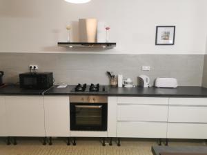 Appartements Spacieux appartement dans Villa : photos des chambres