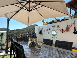 ÁTICO RURAL "EL COLMENAR" para parejas, amigos o familia a la montaña