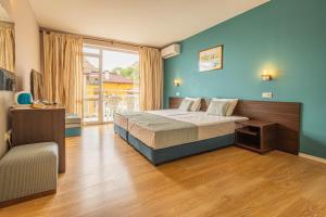 Triple Room with Balcony room in Valeo Hotel