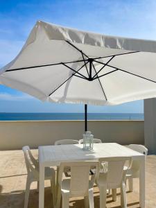 Attico con terrazza vista mare