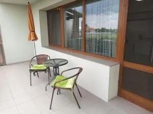 Byt v řadovém domě - Kostomlaty