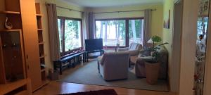 Ferienwohnung Am See mit kleinem Boot und 3er Kajak und 2 SUP