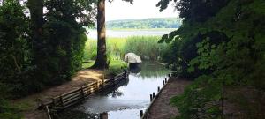 Ferienwohnung Am See mit kleinem Boot und 3er Kajak und 2 SUP