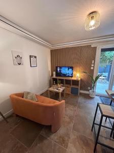 Appartements La terrasse abritee et son spa : photos des chambres