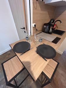 Appartements La terrasse abritee et son spa : photos des chambres