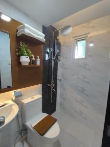 J Spazio Apartelle and Cafe